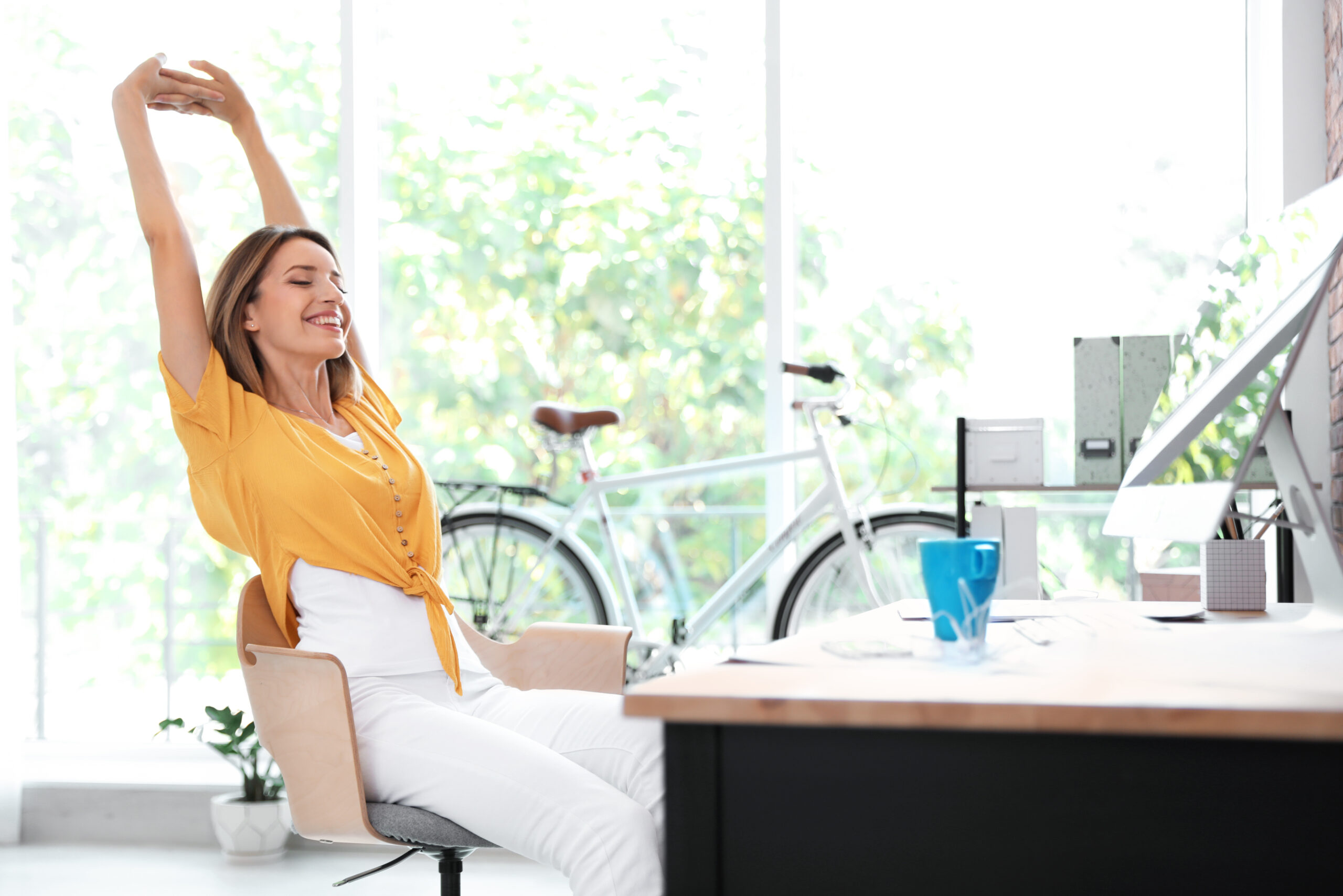 Young professional taking a mindful break from screen time