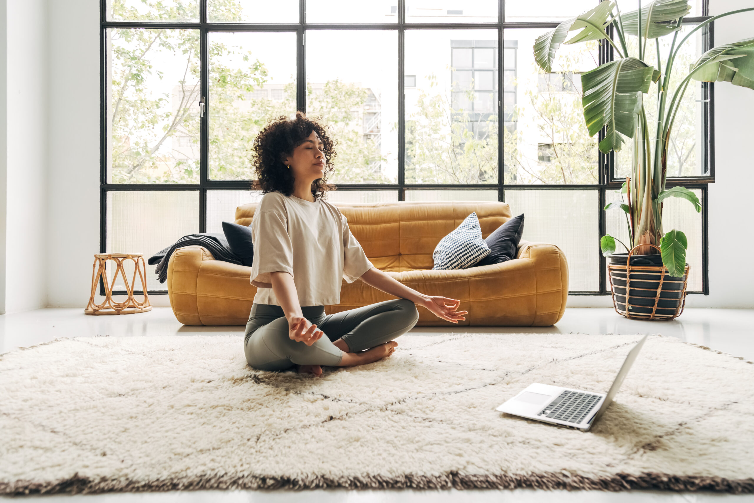 Woman creating a healthy work-life balance while working from home