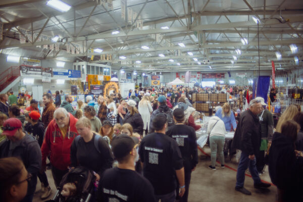 fallfairevent SwoopFiber employees walking through Fall Fair crowd with free WiFi QR code
